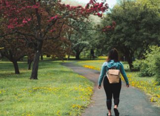 Tone Your Body With Minimum Effort A woman walks in a park