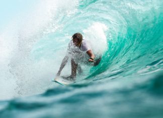 What to Know Before You Try Surfing for the First Time A surfer in Bali, Indonesia