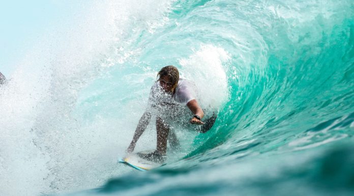 What to Know Before You Try Surfing for the First Time A surfer in Bali, Indonesia