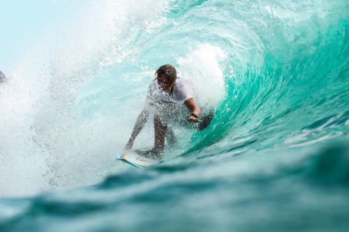 A surfer in Bali, Indonesia
