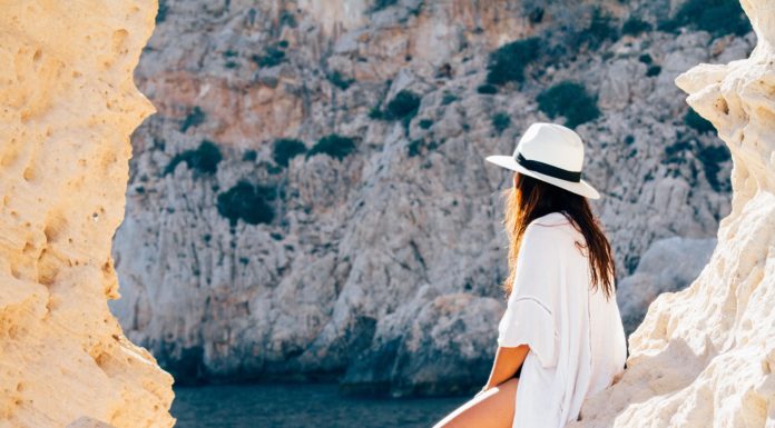 5 Tips For Sticking to Your Vacation Budget Woman on vacation