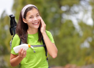 Spots You Shouldn’t Forget When Applying Sunscreen Woman applying sunscreen