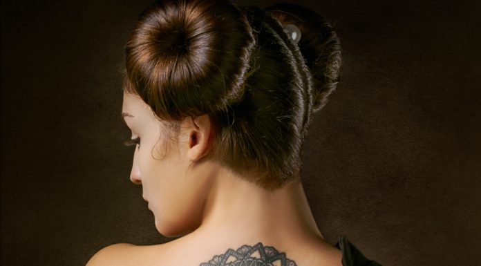 3 Tattoo Trends to Get This Summer Woman with back tattoos