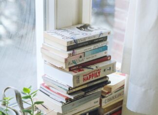 How to Stop Spending Money on Books You Don’t Read Pile of books
