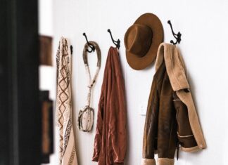 3 Coat Styles To See You Through Winter Coats hanging on a wall