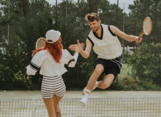 Sports For Couples To Do For A Stronger Relationship Couple playing tennis
