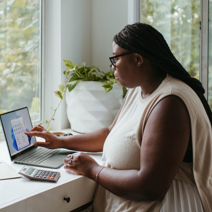 Woman working on a laptop