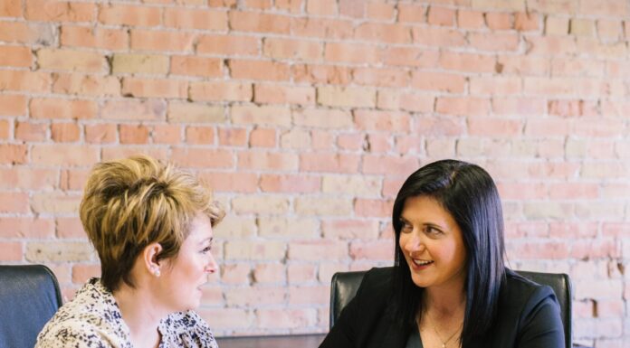 What To Remember When Negotiating Salary Women in a meeting