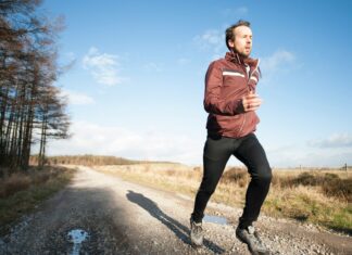 Tips From the Experts for How to Stay Physically Active During the Winter Man staying physically active in the winter