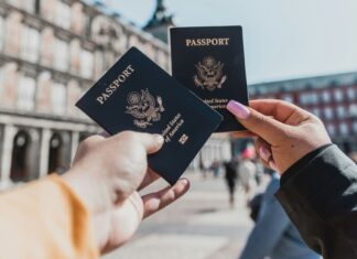 Essential Travel Tips for a Hassle-Free Journey Home During the Festive Season Two hands holding their passports up