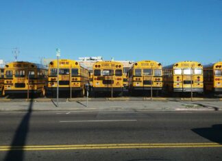 LAUSD to Reopen Most Schools Following Wildfire Closures School buses, Los Angeles, United States.