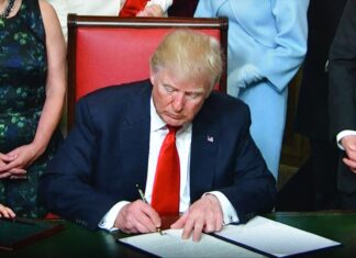 Tariffs Strain U.S.-Canada Relations, Here Are The Economic And Diplomatic Impacts President Donald Trump signing orders